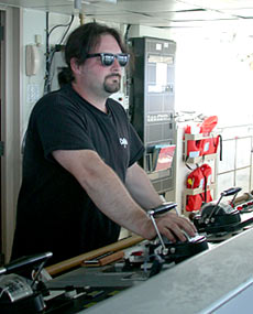 Able-Bodied Seaman, Ed “Catfish” Popowitz stands watch on the bridge during the transit to the Rose Garden hydrothermal vent site in the Galápagos Rift.