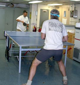 The 2002 Galápagos Rift Invitational table tennis tournament has begun! Captain George Silva plays Com/ET Tim Logan in the first round.