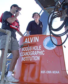Rhian Waller climbs into Alvin today for her first submersible dive. Rhian is a graduate student from Southampton Oceanography Centre in the UK spending the summer in Woods Hole working with Tim Shank and Dan Fornari.