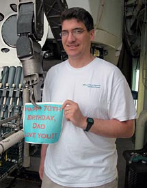 Alvin Pilot Anthony Tarantino examines the submarine in advance of its scheduled dive the next morning.  