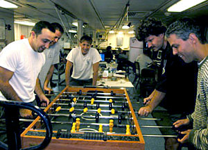 This is the view off the ship’s stern, showing the fishing system set up by Able Seaman Patrick Hennessy. When a fish goes for the trailing lure, the rubber band visible in this photo snaps and shock-loads the bungee cord. At the same time, a steel weight drops to the deck floor, alerting crew members that a fish is on the line.