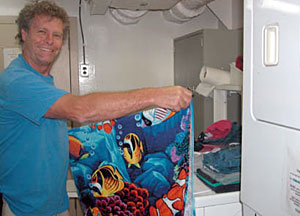 WHOI technician Rod Catanach takes advantage of a weather-induced lull in data collection to get some laundry done. 