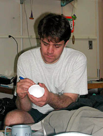 Scientist Jeff Mendez decorates a Styrofoam cup the night before his dive in Alvin. Cup-decorating is a ritual on board; the cups are put in a net bag and hung on the outside of the sub. As Alvin descends, the cups shrink as the water pressure increases. They make great souvenirs. Jeff is good at decorating Styrofoam mannequin heads, too, so we'll see what he comes up with tomorrow.