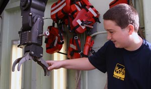 The research vessel Atlantis is a big ship—especially to four-year-old Quinn Relyea of Bellevue, who visited the dock with his dad, Rob, and little brother Braden.