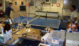 Science experiments and research equipment occupy nearly every table in the ship’s main lab, but the ping-pong table is always kept clear for a stress-relieving game. Third Mate Adam Seamans (left) and Seaman Jack Greenberg battle it out.