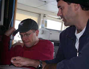 On Saturday, Alvin Pilot Bruce Strickrott (right) reviewed navigation procedures with one of four pilots in training, Sean McPeak.