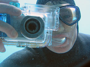 Divers inside Alvin caught swimmer Mark Spear snapping photos of them through the portholes during the sub’s deployment. (Photo by Bruce Strickrott) 