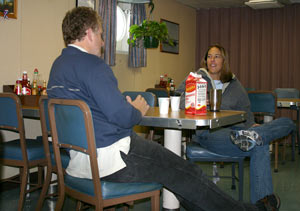 In the ship’s galley, where scientists and crew gather for meals, Marine Geologist Kevin Brown of the Scripps Institution of Oceanography and Microbiologist Sheryl Bolton of the University of Washington swap stories about their science research.
