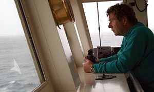 On the bridge at 6 a.m., Expedition Leader Pat Hickey gazed through rain-slicked windows to decide if it was safe to dive today. He canceled the dive when the 35-knot (40 mile-per-hour) winds and 10-foot (3-meter) seas showed no sign of abating.