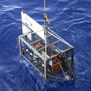 On this expedition, geologist Dan Fornari and volcanologist Adam Soule have started using a specially-designed digital camera system that photographs the seafloor as it is towed by the ship. We call it the TowCam.