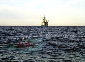 The sail is just about under water. 