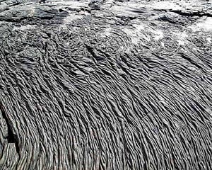 Ropy pahoehoe lava on Santiago Island, Galápagos. Photo by Bob Reynolds.